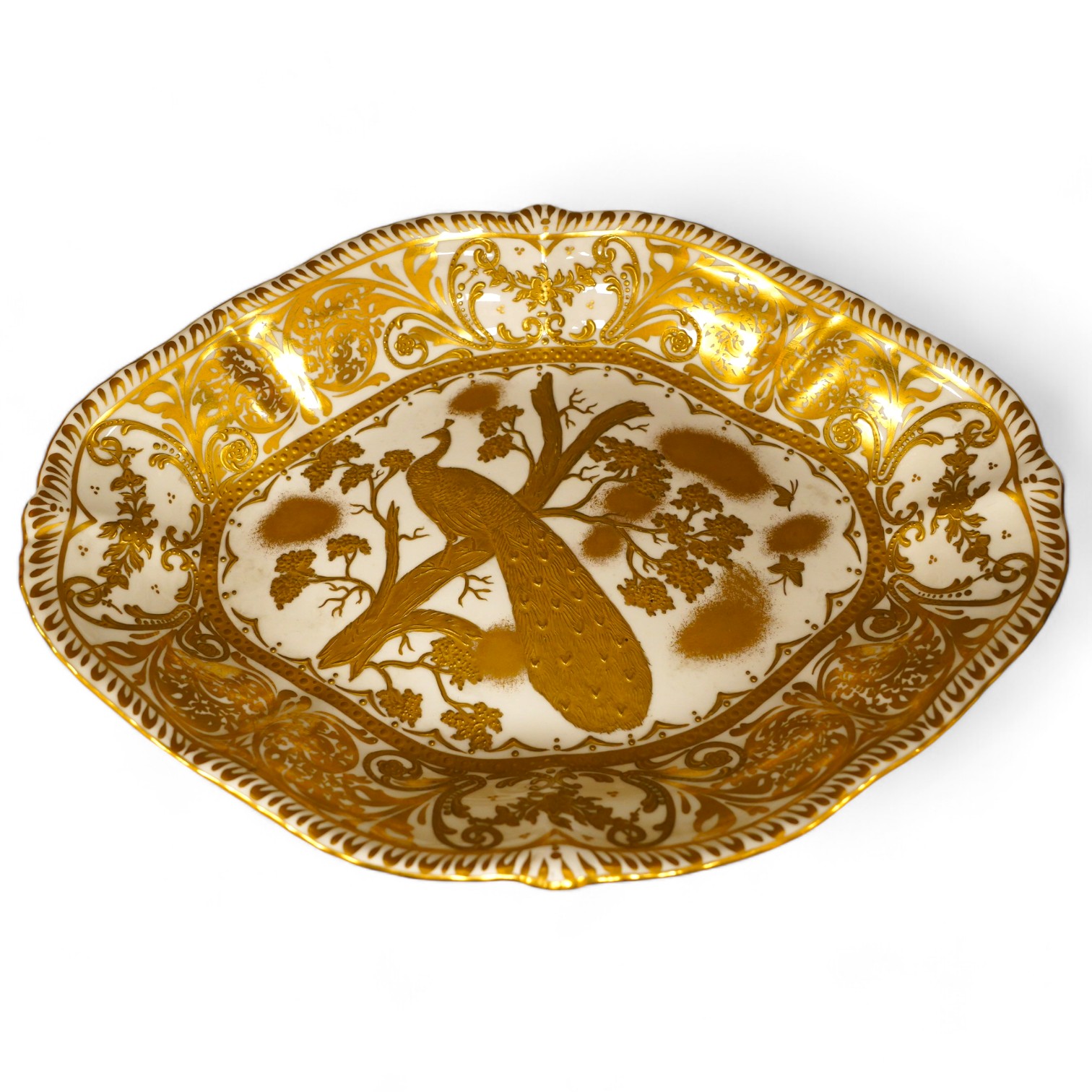 A Crown Derby gold Aves dessert dish with raised design, 28cm wide. Condition - fair to good, some wear to surface